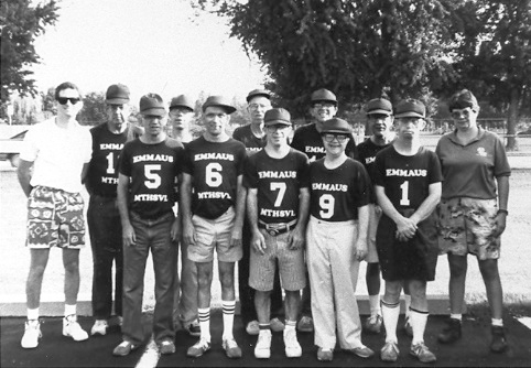 A group of young men wearing sports jerseys